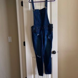 Stretchy denim distressed overalls